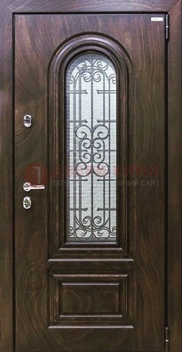 Темная филенчатая железная дверь со стеклом и ковкой ДСК-102 в Жуковском