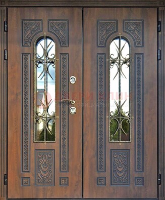 Двухстворчатая стальная дверь со стеклом и ковкой для дома ДСК-153 в Всеволожске