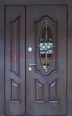 Темная металлическая дверь Винорит со стеклом и ковкой ДСК-239 в Всеволожске