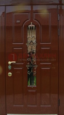 Красивая металлическая дверь со стеклом и ковкой ДСК-33 в Всеволожске